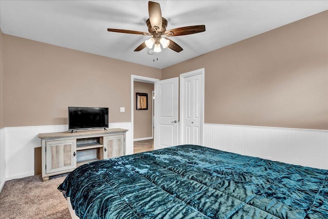 carpeted bedroom with ceiling fan