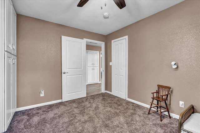 unfurnished bedroom with carpet flooring and ceiling fan