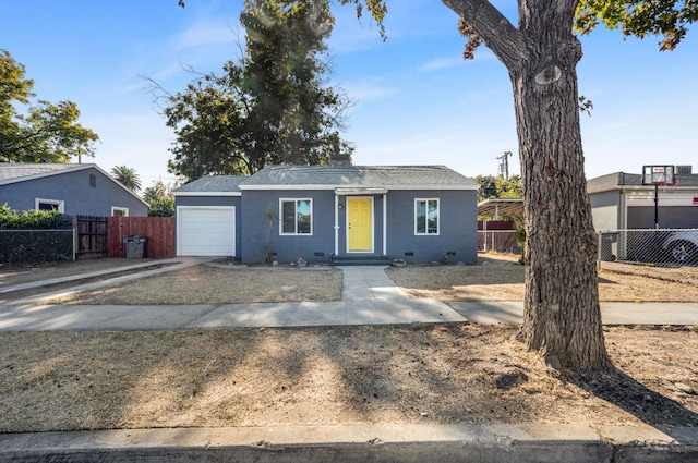 ranch-style home with a garage