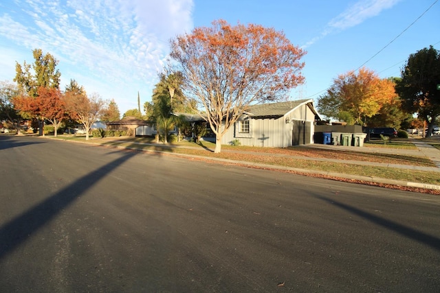 exterior space with curbs and sidewalks