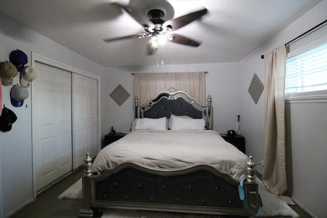 bedroom with a ceiling fan and a closet