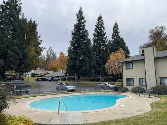 view of pool featuring a patio area