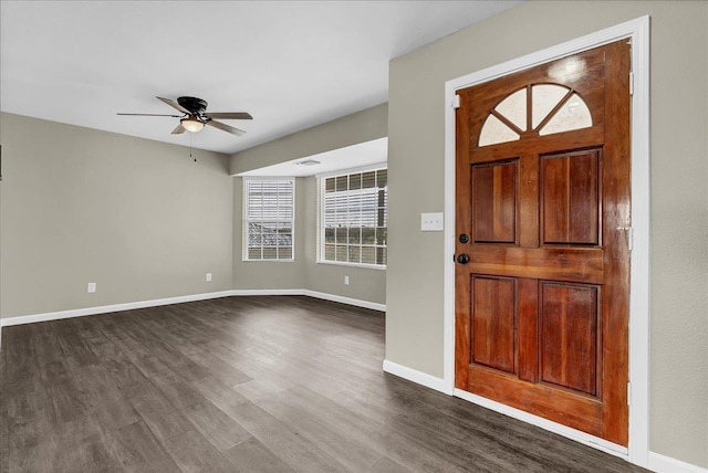 foyer entrance featuring ceiling fan and dark hardwood / wood-style flooring