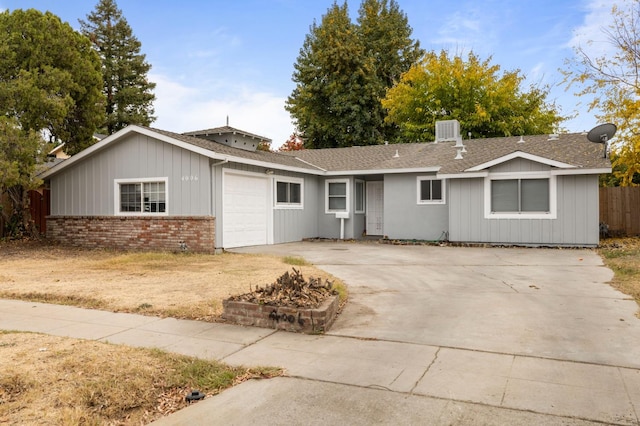 single story home with a garage