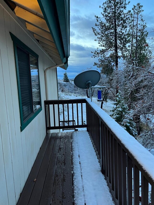 view of snow covered deck