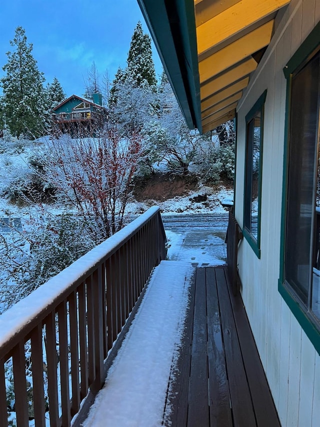 view of snow covered deck