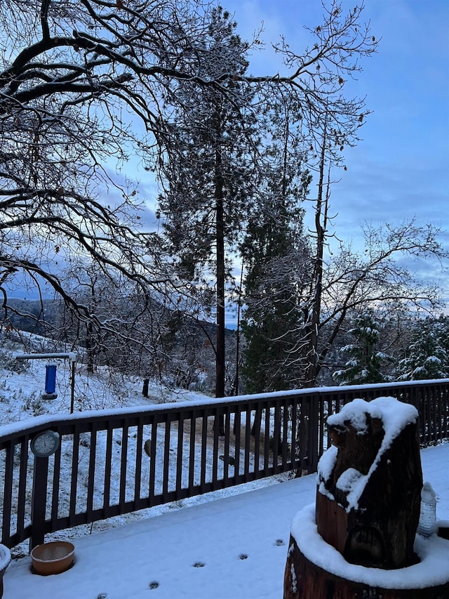 view of snow covered deck