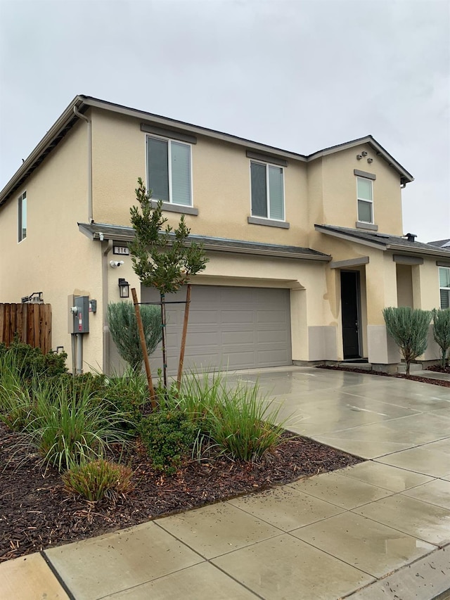 view of front of property with a garage