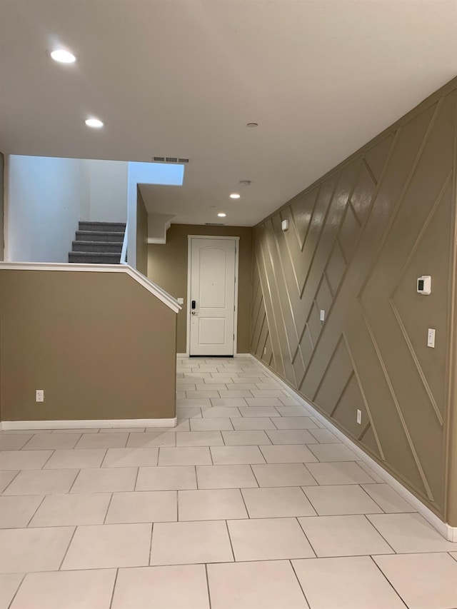 interior space featuring light tile patterned floors