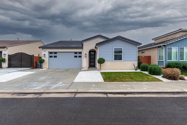 view of front of home with a garage