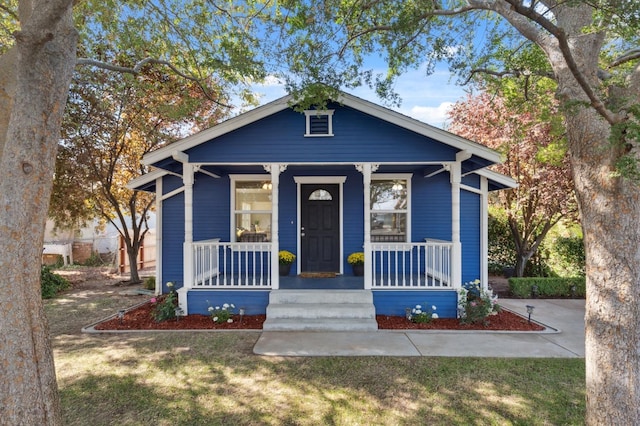 bungalow-style home with covered porch