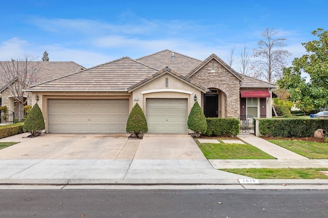 ranch-style home with a garage