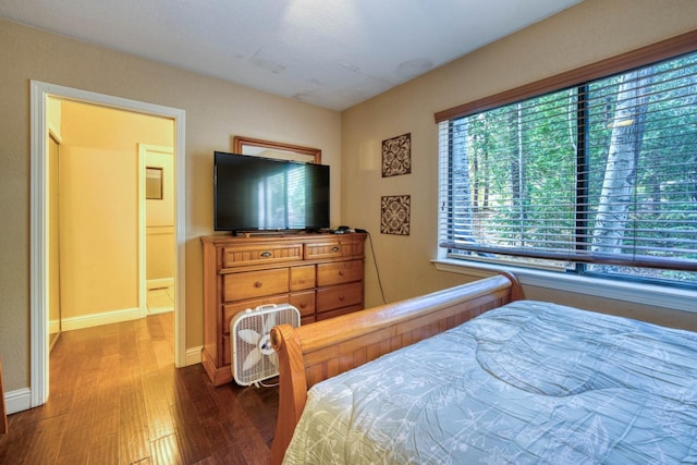 bedroom featuring wood-type flooring