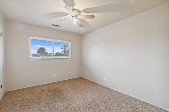 12713 Rd 37 Unit 1/2, Madera, CA 93636 - empty room featuring carpet, a ceiling fan, and baseboards