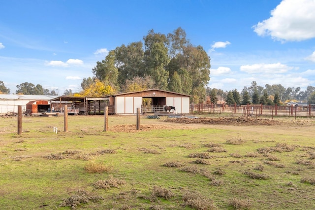 12713 Rd 37 Unit 1/2, Madera, CA 93636 - view of yard featuring an outbuilding and a view of rural / pastoral area