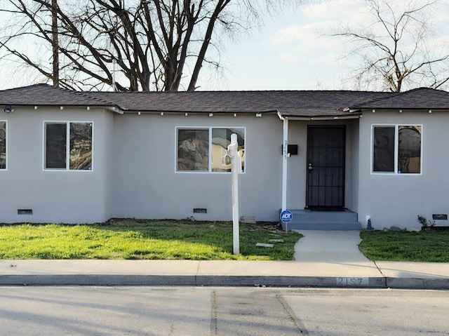 view of front of house with a front yard