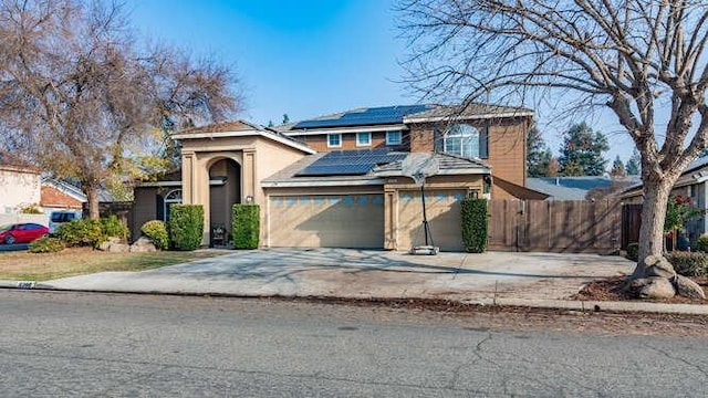 view of property featuring solar panels