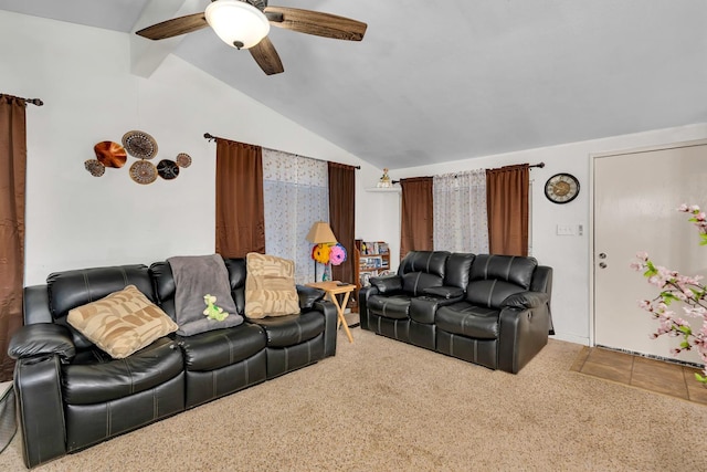 living room featuring carpet flooring, ceiling fan, and lofted ceiling