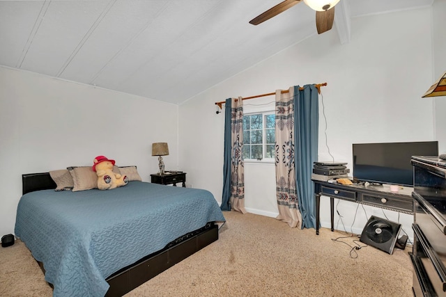 bedroom with vaulted ceiling with beams, ceiling fan, and light colored carpet