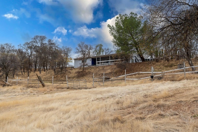 view of yard featuring a rural view