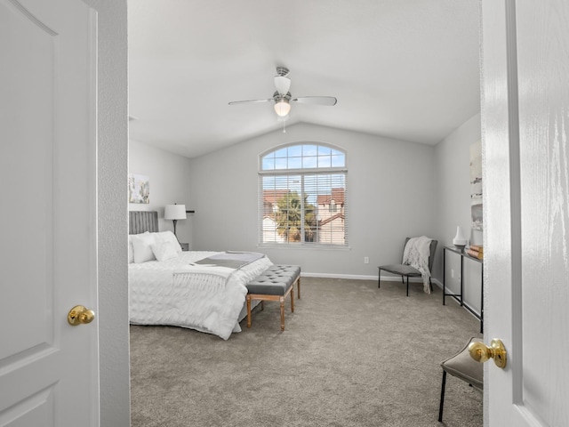 carpeted bedroom with lofted ceiling and ceiling fan