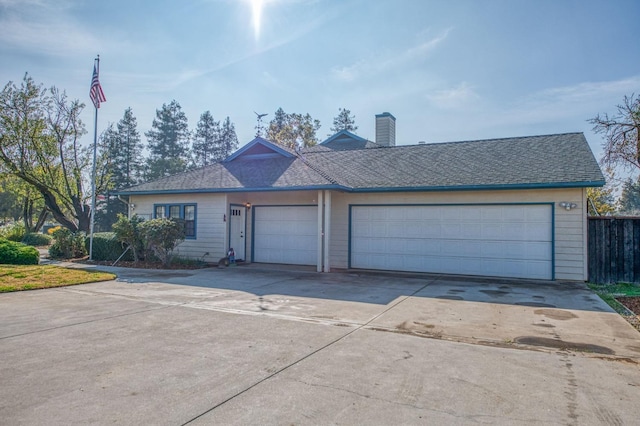 single story home featuring a garage