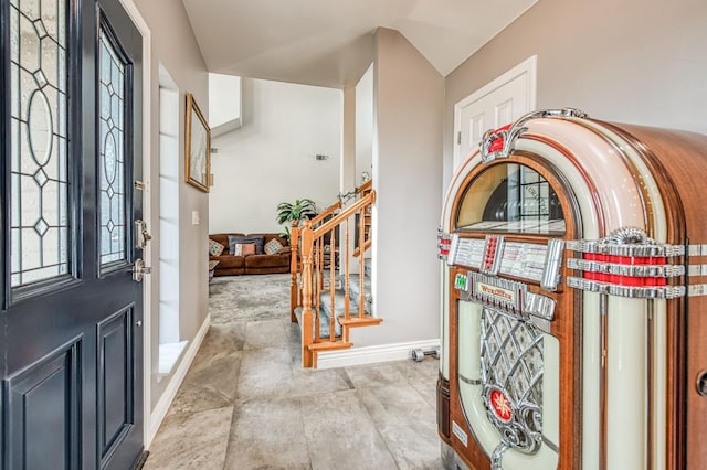 entryway with vaulted ceiling