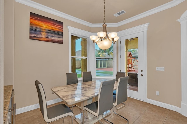 tiled dining space with ornamental molding, an inviting chandelier, and a healthy amount of sunlight