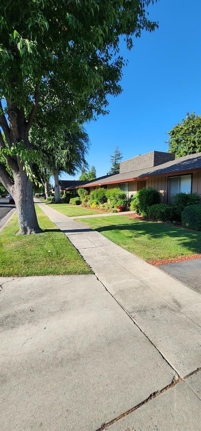 exterior space with a lawn