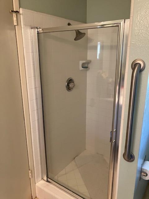 bathroom featuring walk in shower