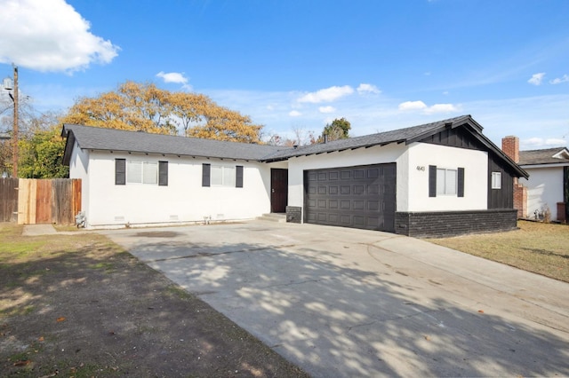 single story home featuring a garage