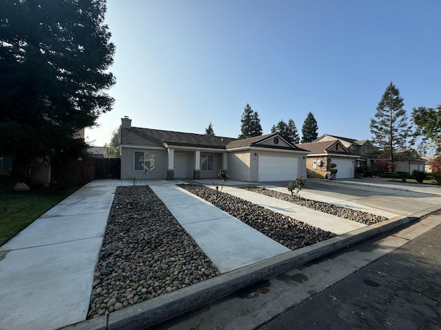 ranch-style house featuring a garage