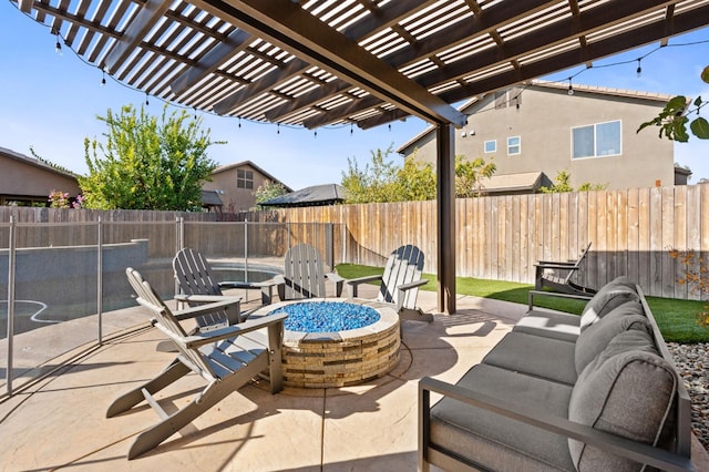 view of patio with a fenced backyard, a fire pit, and a pergola