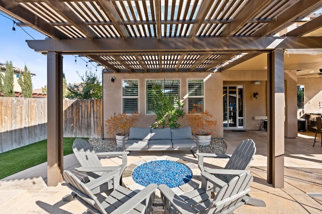 view of patio / terrace featuring a pergola, fence, and an outdoor hangout area