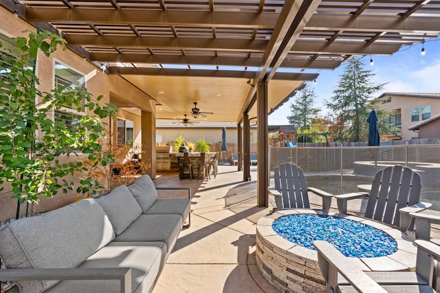 view of patio featuring ceiling fan, fence, outdoor lounge area, a pergola, and outdoor dining space