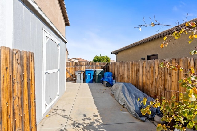 view of patio with fence