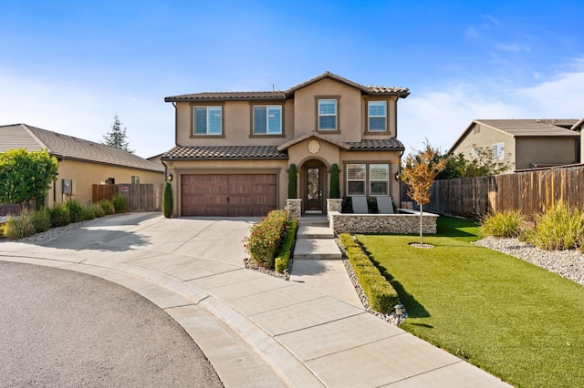 view of front of home with concrete driveway, fence, an attached garage, and stucco siding