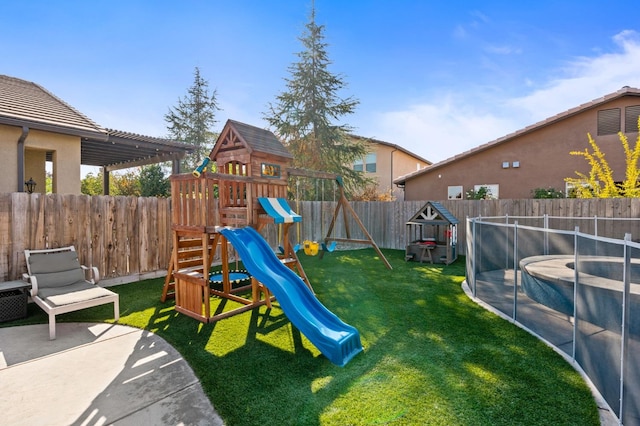 view of playground featuring a fenced in pool, a fenced backyard, a lawn, and a patio