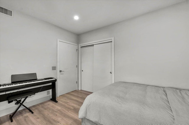 4481 N Palm, Fresno, CA 93704 - bedroom with light wood-style floors and a closet