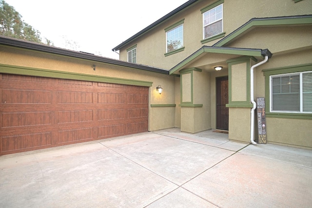 exterior space with a garage