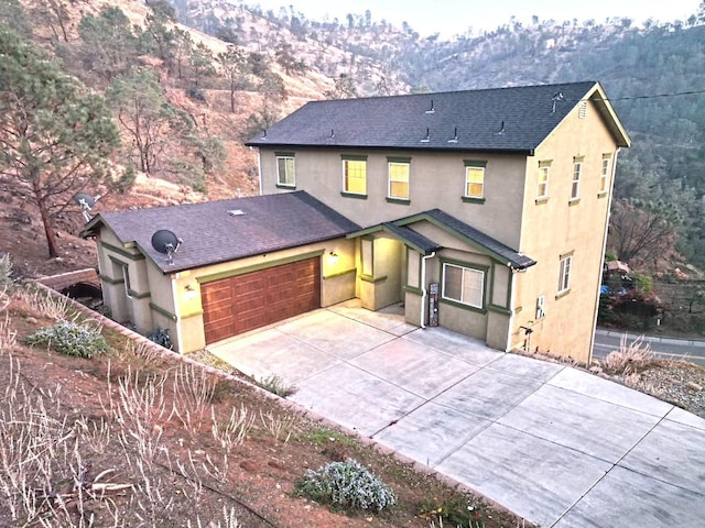 front of property with a mountain view