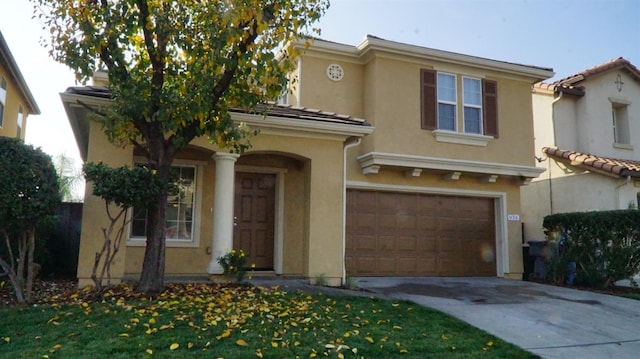 view of front of property featuring a garage