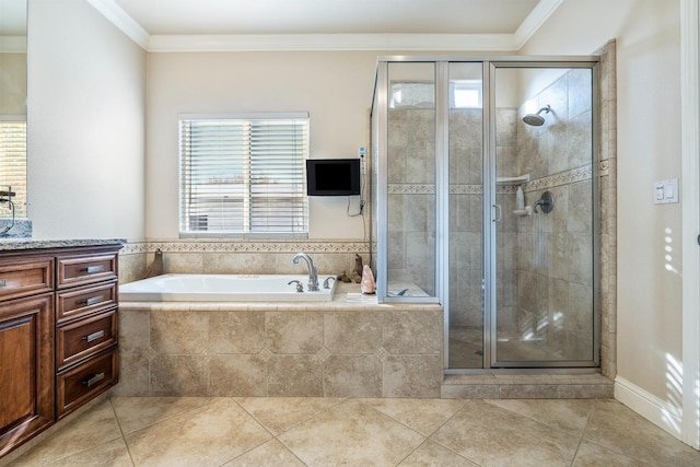 bathroom featuring vanity, ornamental molding, independent shower and bath, and tile patterned flooring