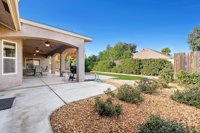 view of patio with ceiling fan