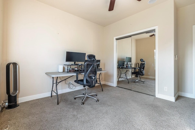 office with carpet floors and ceiling fan