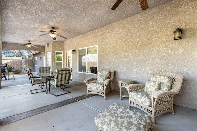 view of patio / terrace featuring ceiling fan