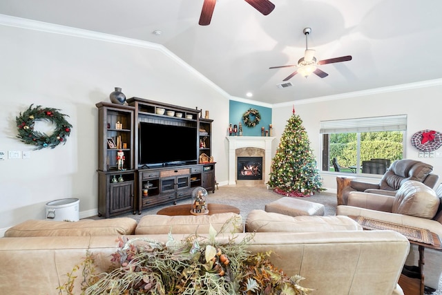 living room featuring vaulted ceiling, carpet flooring, and crown molding