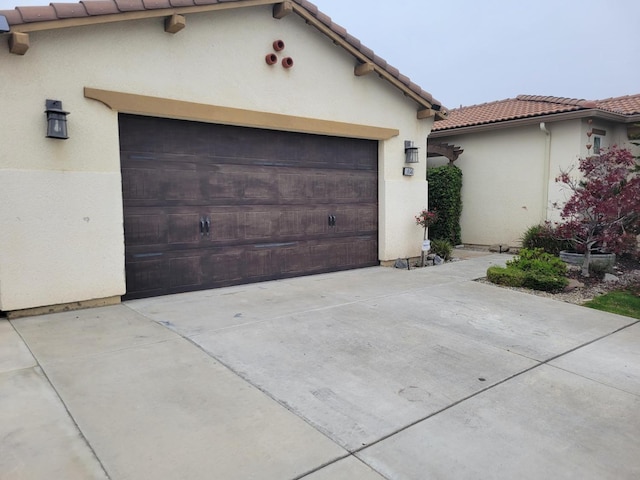 exterior space with a garage