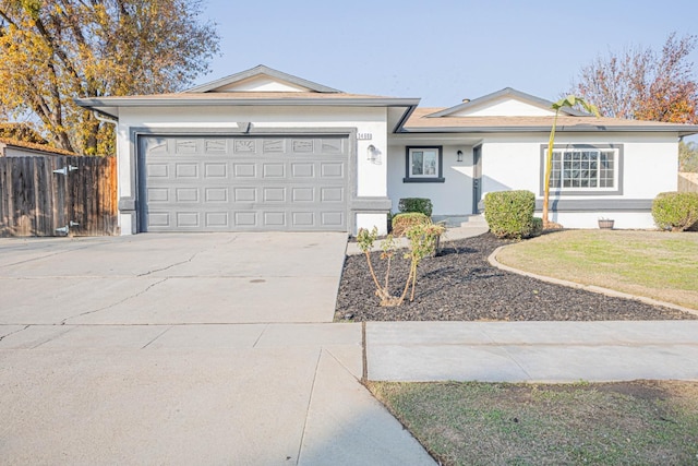 ranch-style house featuring a garage