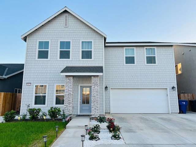 view of front of home with a garage